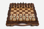 Close-up of the beech and walnut chess pieces on the inlaid squares