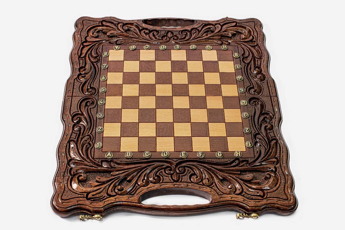 Classic chess and backgammon set shown folded with carry handle