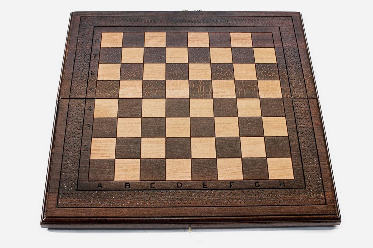 Classic chess and backgammon set shown folded with carry handle