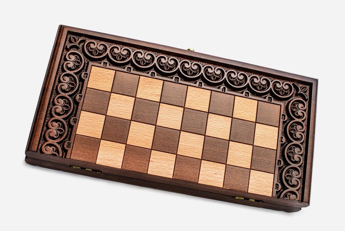 Close-up of a floral carved border carving on the beech board