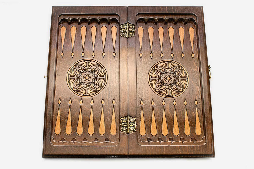 Classic chess and backgammon set shown folded with carry handle