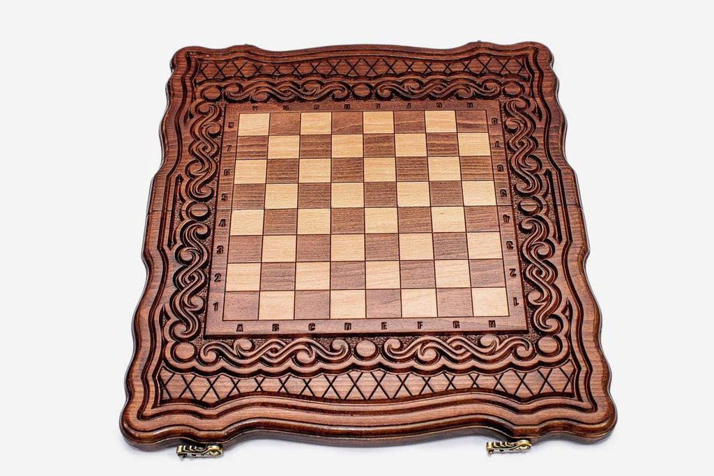 Classic chess set shown folded with carry handle