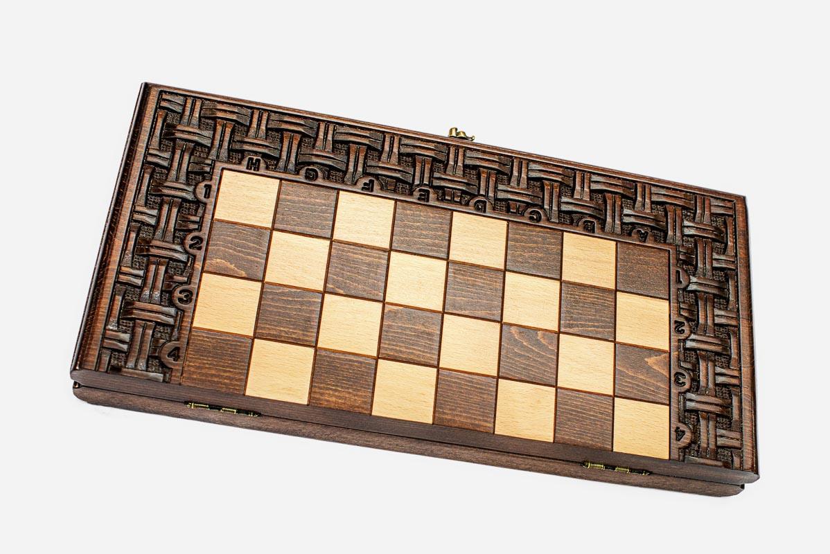 Close-up of a lattice design carving on the beech board