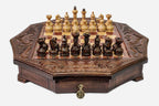 Octagonal wooden chess set in warm mahogany finish with carved acanthus corners and Staunton pieces set up for play