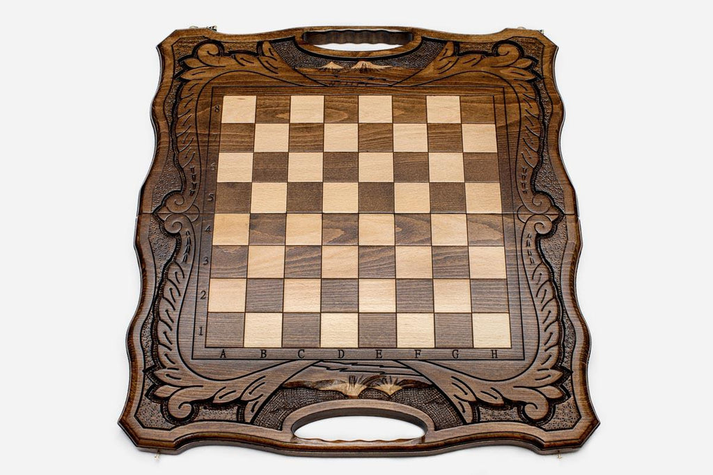 Close-up of the beech and walnut chess pieces on the inlaid squares