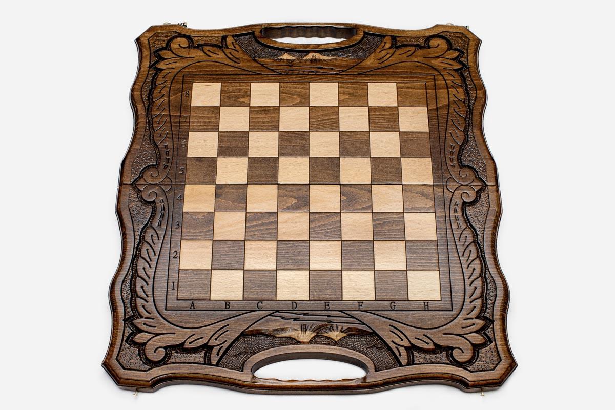 Close-up of the beech and walnut chess pieces on the inlaid squares