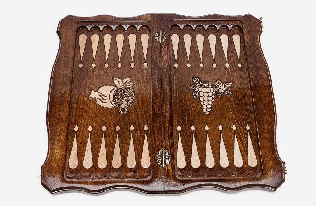 Classic chess and backgammon set shown folded with carry handle