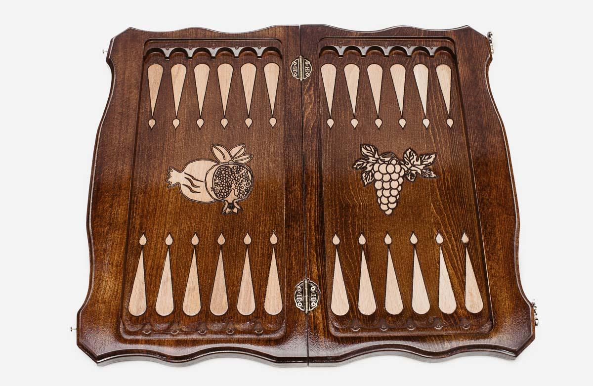 Classic chess and backgammon set shown folded with carry handle