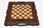 Classic chess and backgammon set shown folded with carry handle