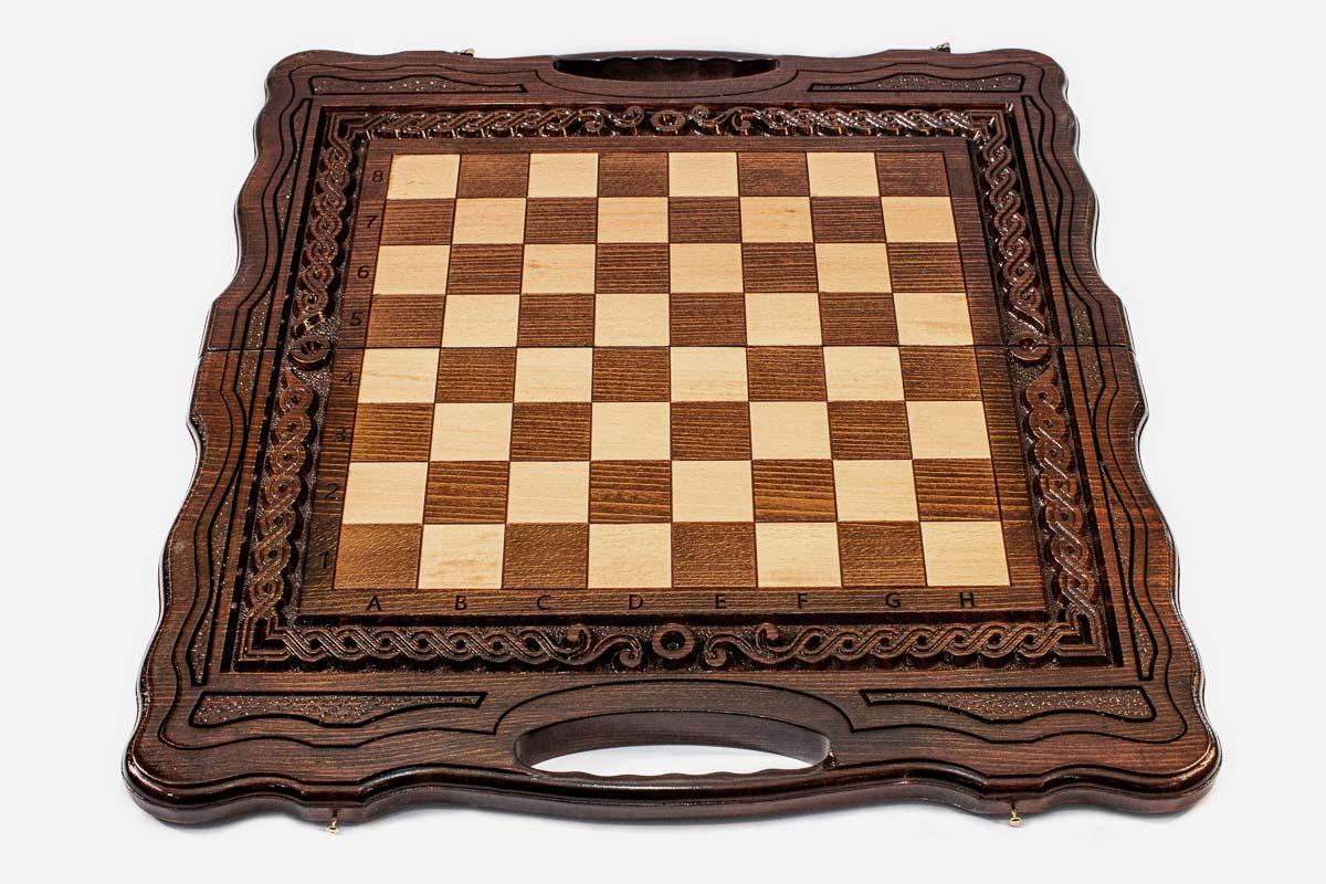Classic chess and backgammon set shown folded with carry handle
