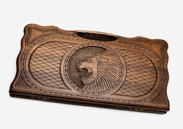 Armenian beechwood backgammon board carved with a roaring lion in a diamond-lattice oval