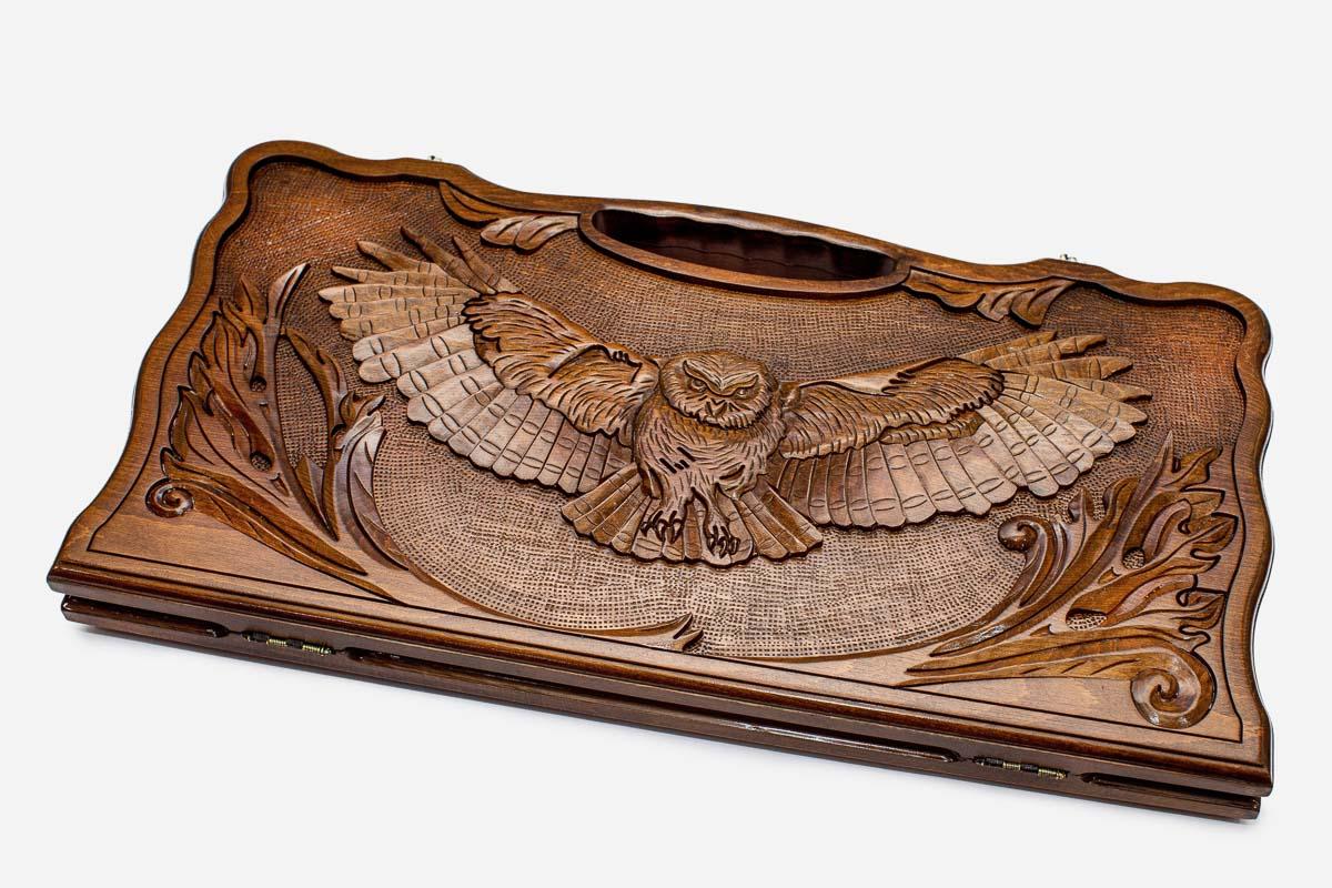 Carved beechwood backgammon board with an owl medallion and a carry handle, propped open