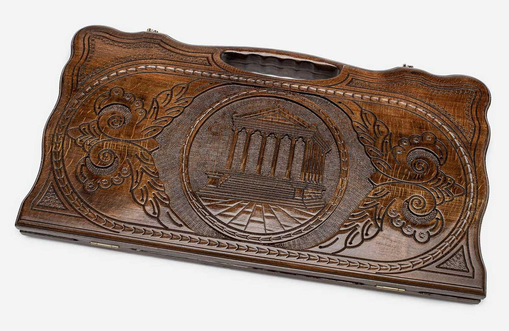 Carved beechwood backgammon board with the Temple of Garni in a medallion, propped open