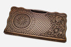Carved beechwood backgammon board with a knotwork rosette and an eagle, propped open
