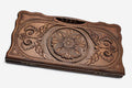Carved beechwood backgammon board with a floral rosette medallion, propped open