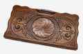 Carved beechwood backgammon board with an infinity medallion and a carry handle, propped open