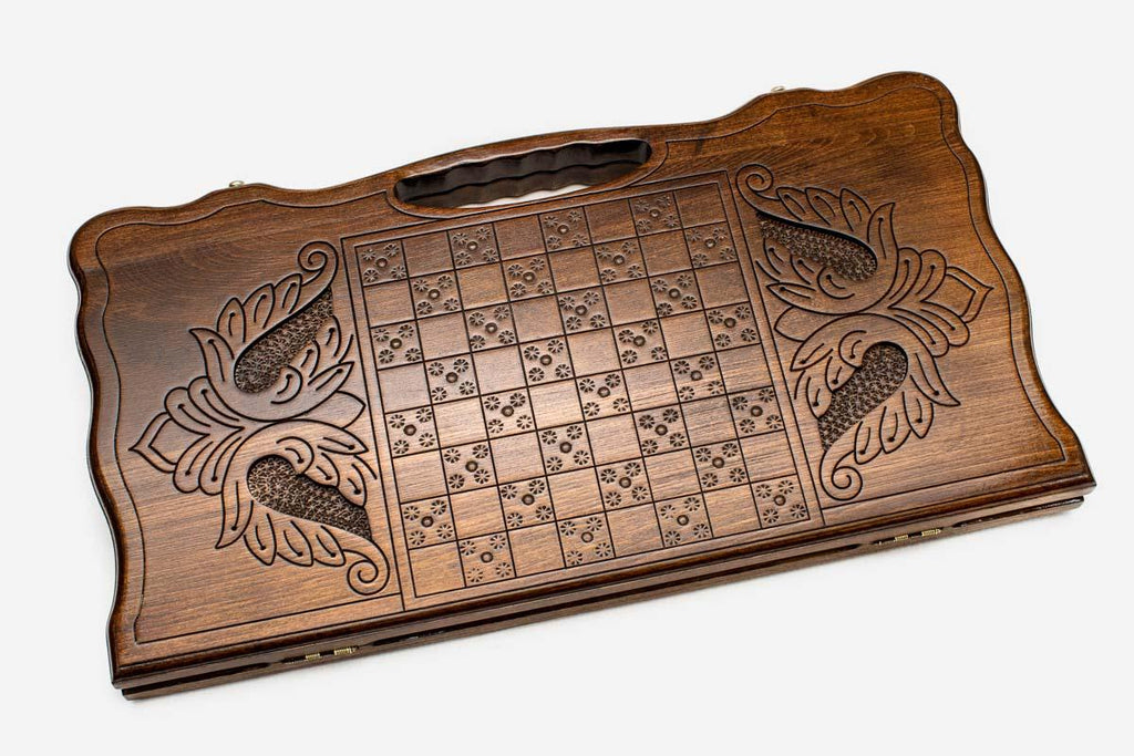 Angled view of the infinity medallion carved backgammon board