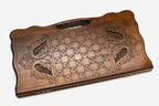 Angled view of the infinity medallion carved backgammon board