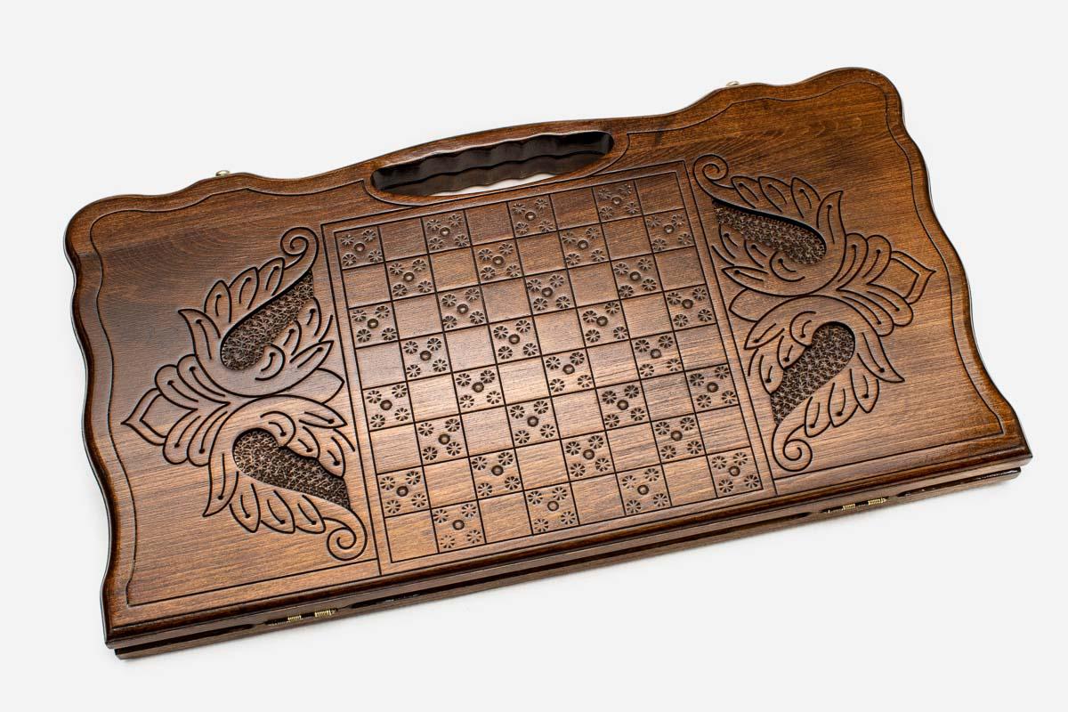 Angled view of the infinity medallion carved backgammon board