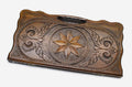 Carved beechwood backgammon board with an octagon medallion and a carry handle, propped open