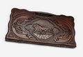 Carved beechwood backgammon board with a lion medallion and a carry handle, propped open