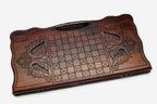 Angled view of the lion medallion carved backgammon board