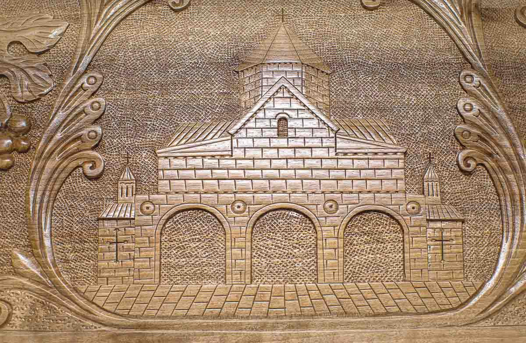 The backgammon board opened to show the wooden playing surface