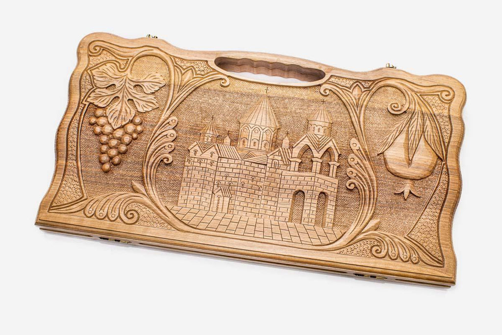 Carved walnut backgammon board with Echmiadzin Cathedral in a medallion, propped open
