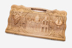 Carved walnut backgammon board with Echmiadzin Cathedral in a medallion, propped open