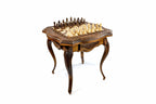 Handmade contour-outline chess table in warm carved wood