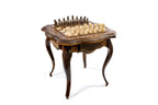 Handcrafted walnut chess table with carved detailing