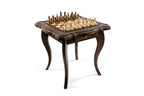 Close-up of the carved chessboard surface and ornamentation