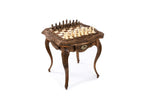 Wooden chess table with floral carved border and basket-weave legs