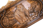 The reverse side of the Hrachya Ohanyan board featuring the detailed hand-carved deer among forest trees.