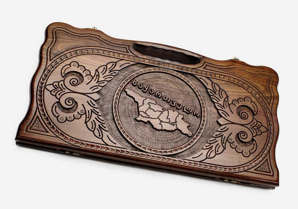 Carved beechwood backgammon board with the map of Georgia in a medallion, propped open