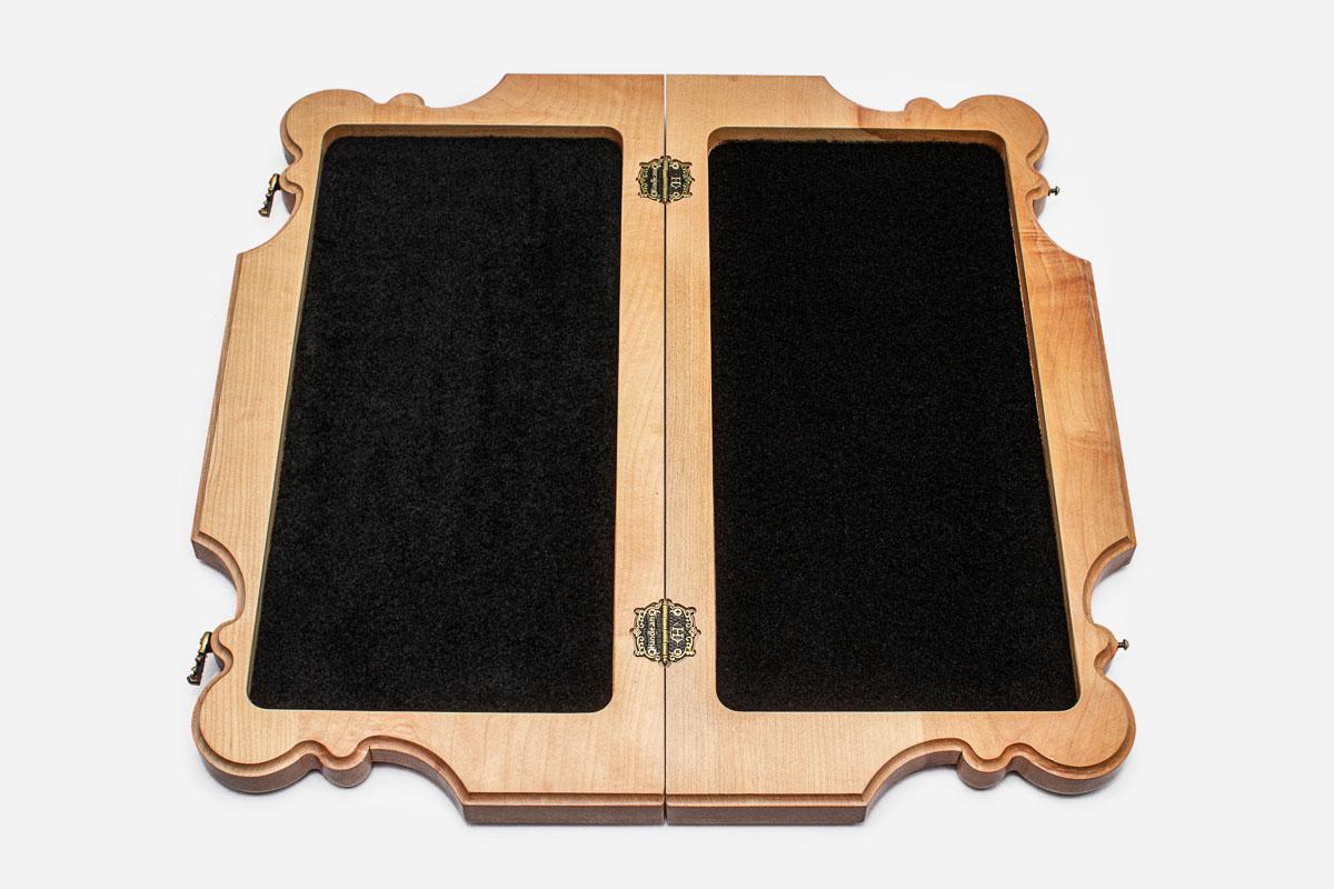 Overhead view of the full set of pieces on the maple and walnut board