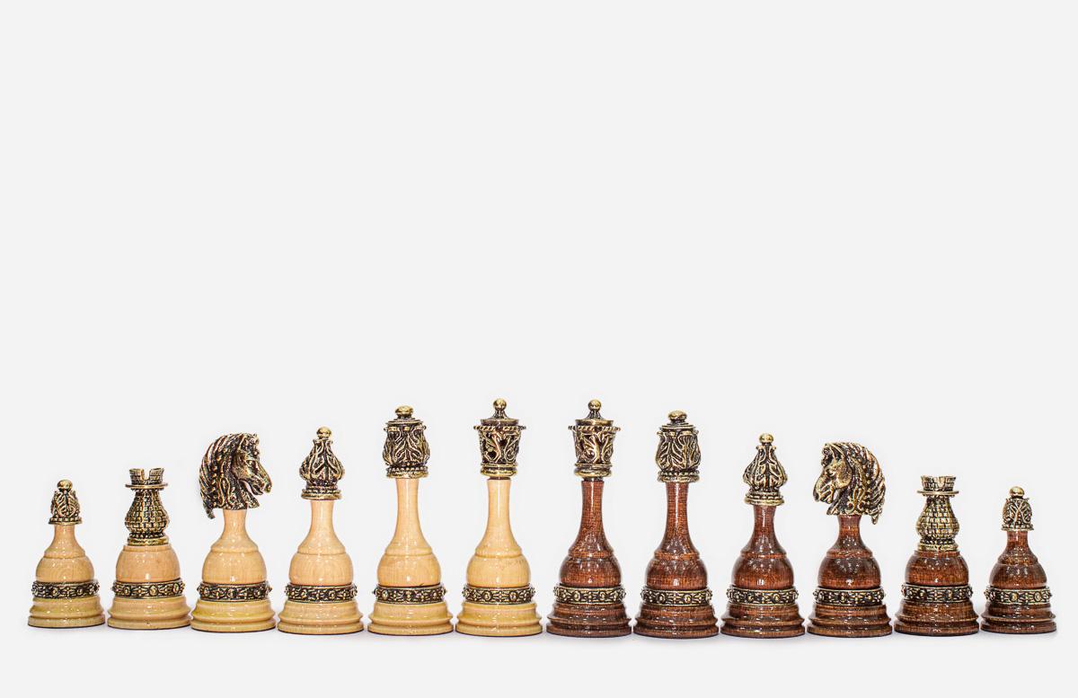 The finished royal carved chess set shown from an angle