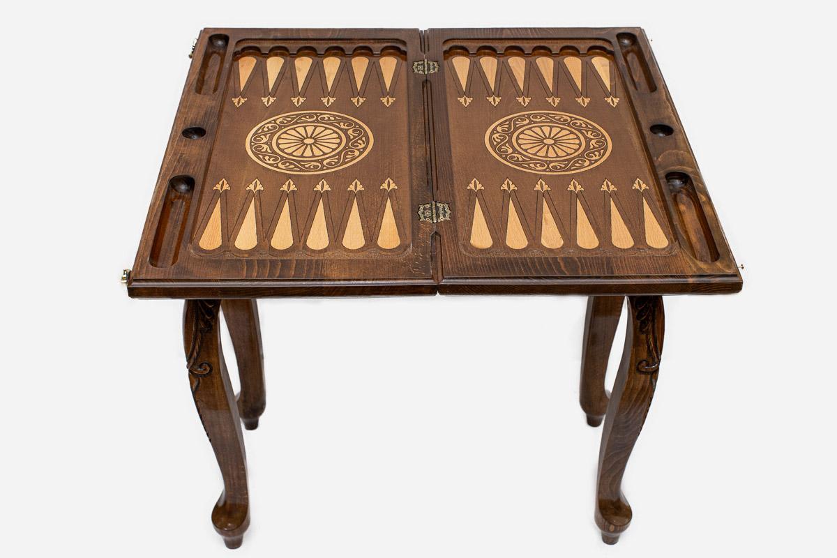 Handle Scrollwork chess-backgammon table with chess pieces set up, angled view