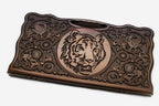Carved beechwood backgammon board with a tiger medallion and a carry handle, propped open
