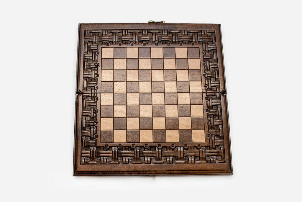 Close-up of a lattice design carving on the beech board