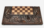 Close-up of crowned kings carving on the beech board