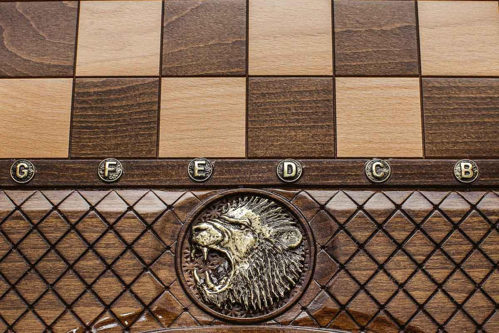 Lion chess and backgammon set shown folded with carry handle