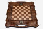Angled view of the chess-backgammon set with its geometric wooden pieces