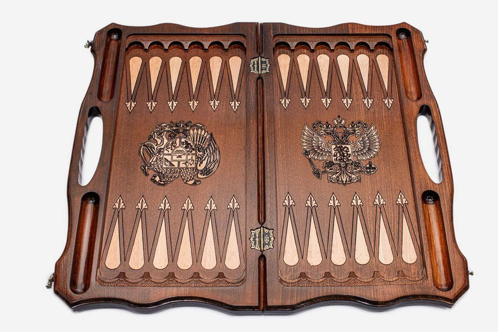 Overhead view of the chessboard and full set of light and dark pieces