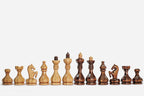 The folding chess-backgammon set shown closed with its carry-handle cutout