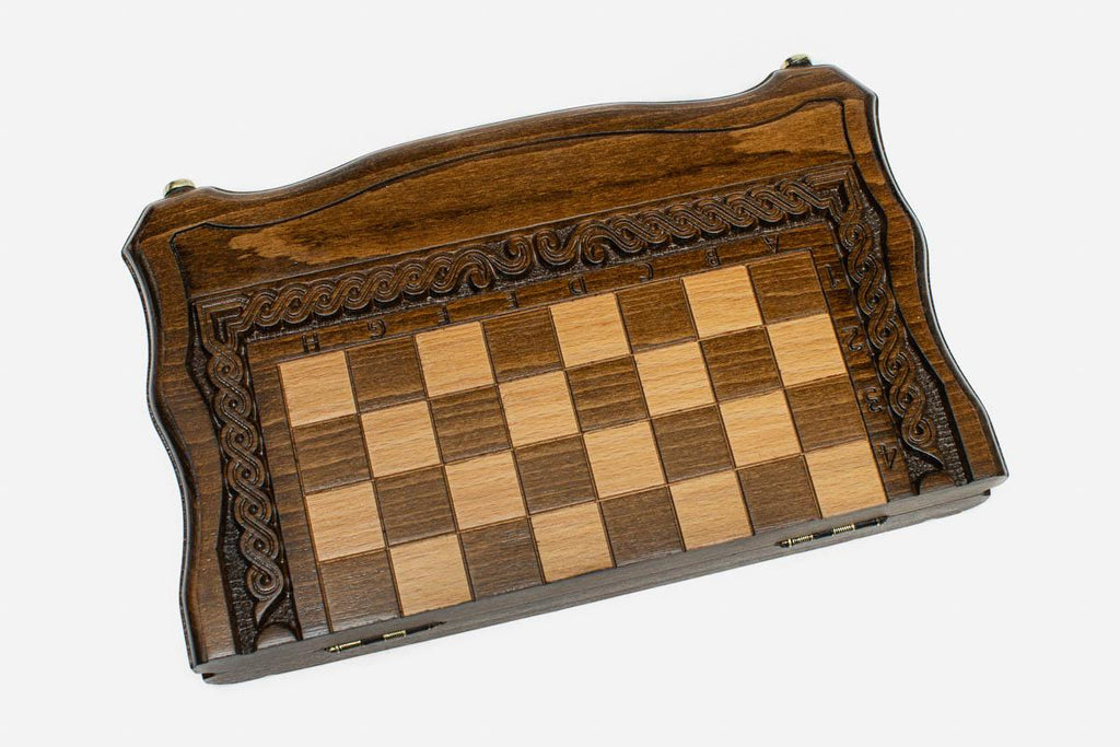 Lattice chess set shown folded with carry handle