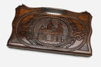 Compact carved beechwood backgammon board with Echmiadzin Cathedral and a carry handle, propped open