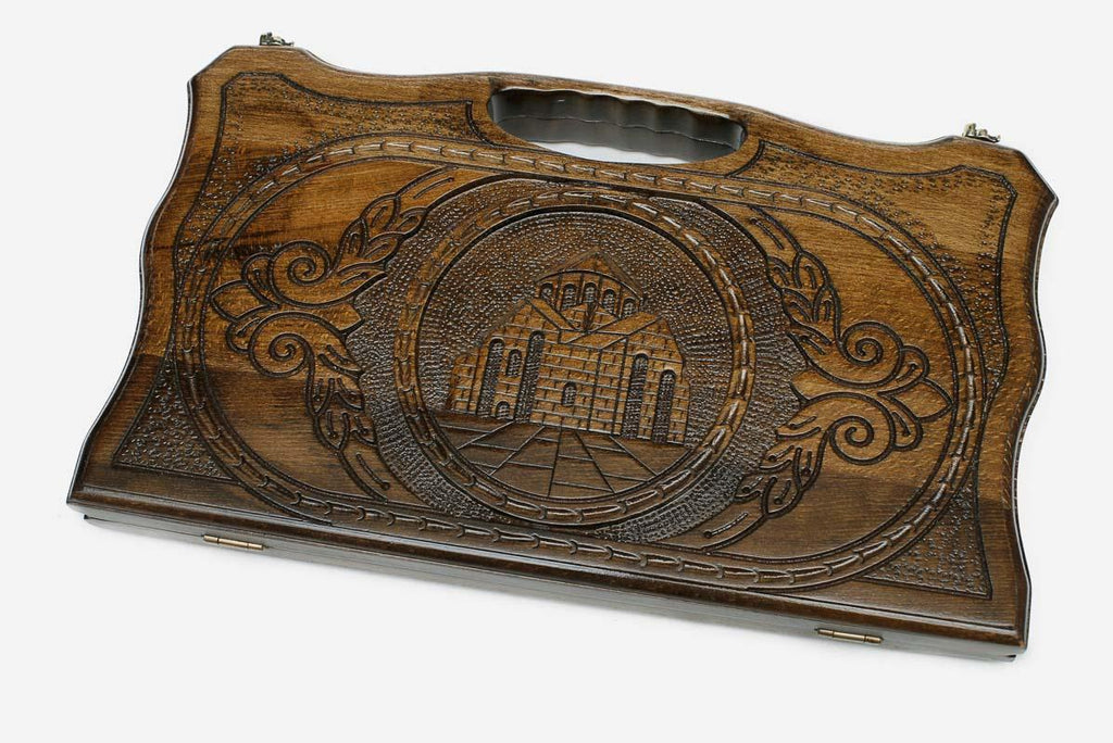 Compact carved beechwood backgammon board with the Saint Hripsime Church and a carry handle, propped open