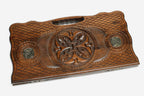 Angled view of the bronze rosette ornament backgammon board