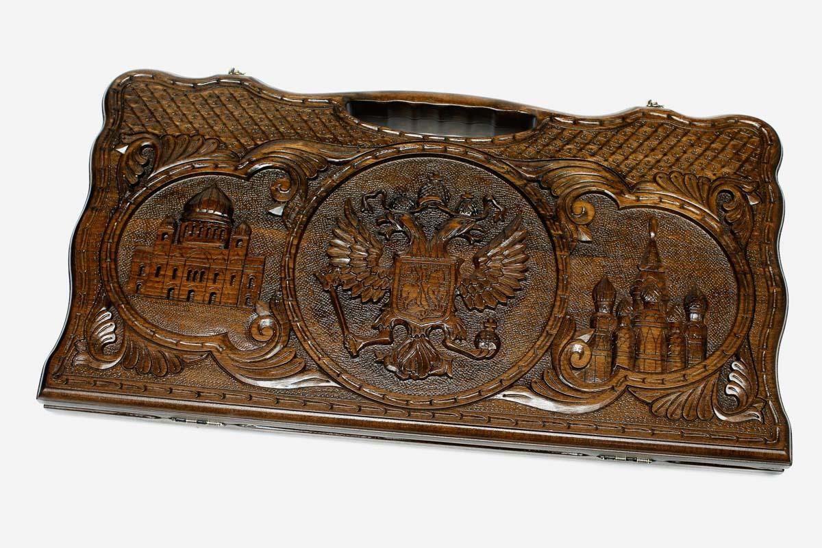 Carved beechwood backgammon board with three Russian landmark medallions and a carry handle, propped open